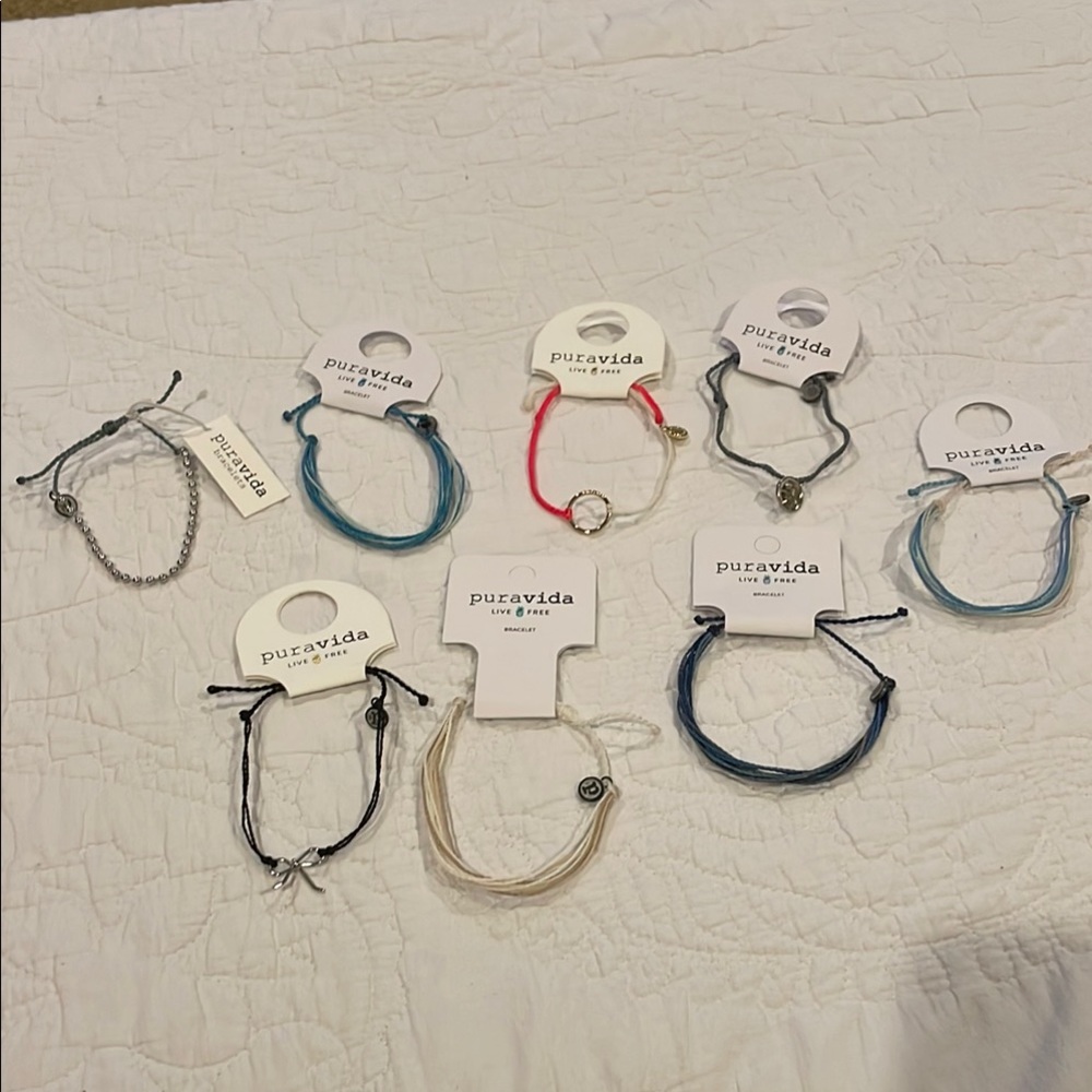 Set of 8 pura vida bracelets. New!